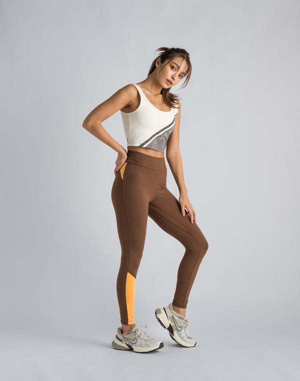 CRONOS WOMEN SWITCHED LOGO LEGGINGS【BROWN】