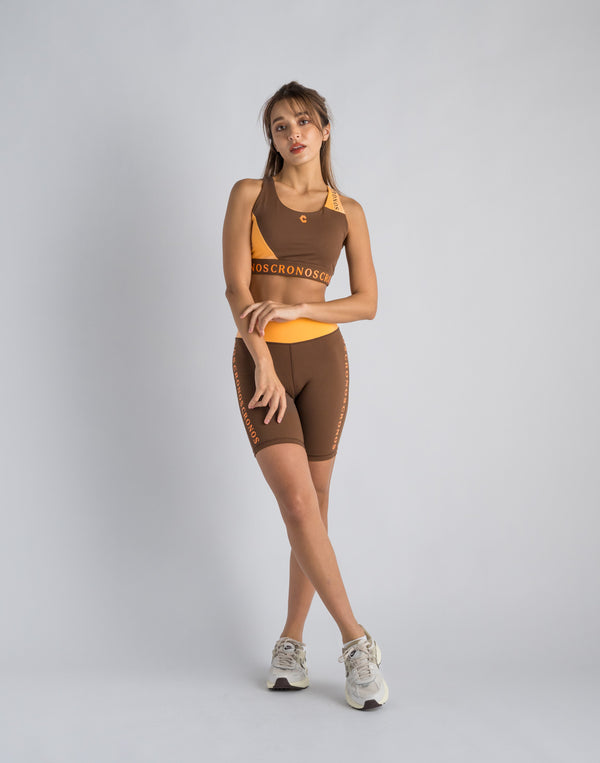 CRONOS WOMEN SWITCHED LOGO SHORT LEGGINGS【BROWN】