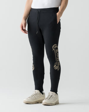 CRONOS BLACKLETTER SKINNY PANTS【BLACK×GREIGE】