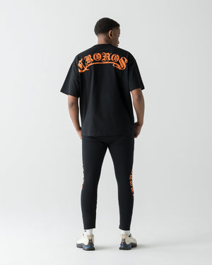 CRONOS BLACKLETTER SKINNY PANTS【BLACK×ORANGE】