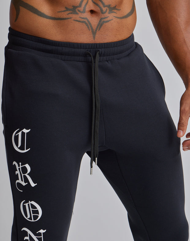 CRONOS BLACK LETTER LONGPANTS【BLACK】