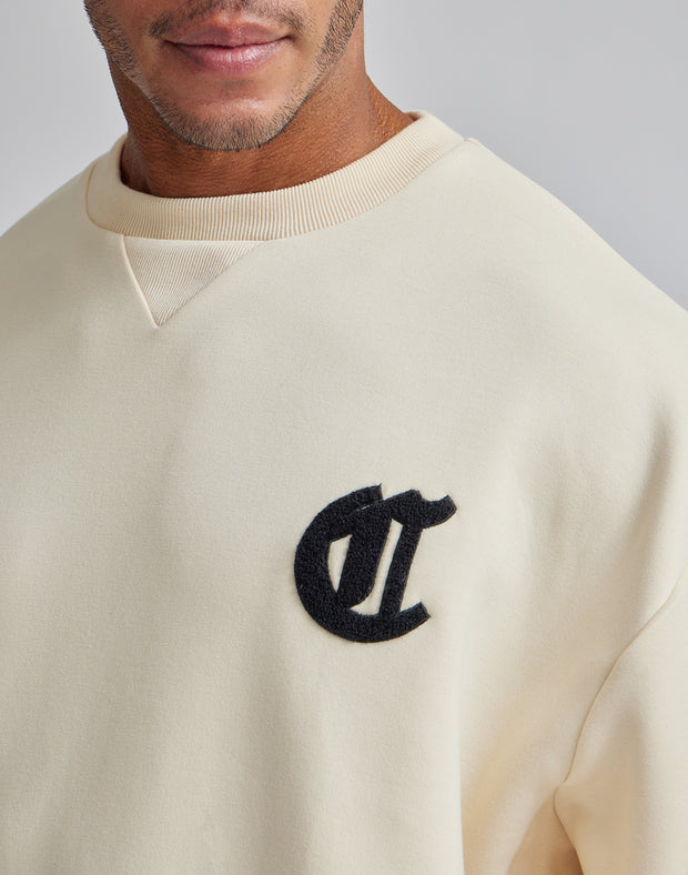 CRONOS BLACK LETTER SWEAT TOP【BEIGE】 - クロノス CRONOS Official