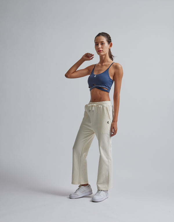 CRONOS WOMEN HIP LOGO FLARE PANTS【CREAM】
