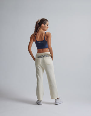 CRONOS WOMEN HIP LOGO FLARE PANTS【CREAM】
