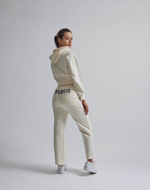 CRONOS WOMEN HIP LOGO FLARE PANTS【CREAM】