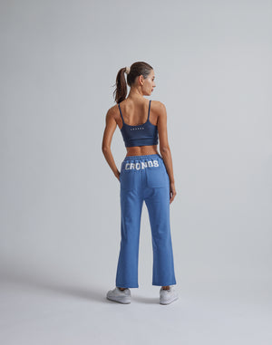 CRONOS WOMEN HIP LOGO FLARE PANTS【BLUE】