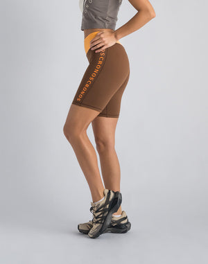 CRONOS WOMEN SWITCHED LOGO SHORT LEGGINGS【BROWN】